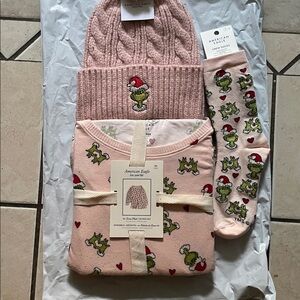 2025 Plush luxe Grinch SOLD OUT Pj set- pink w/ hearts, Santa hat size MEDIUM